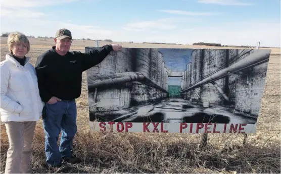  ?? Alex Panetta/The Canadian Press ?? Ron and Jeanne Crumly, seen on their property in Page, Neb., say they have no intention of signing to allow the Keystone XL pipeline on their land — whatever they’re offered.