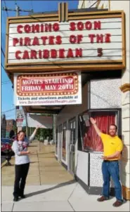  ?? DIGITAL FIRST MEDIA FILE PHOTO ?? The State Theatre of Boyertown began showing films again in May 2017, following a two-year hiatus. In this file photo are State Theatre Manager Shannon Anthony, left, and Vice President Jake Zimmers beneath the State Theatre’s marquee announcing the...