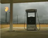  ?? SPENCER PLATT/GETTY 2015 ?? Excess Permian Basin natural gas is burned off in Garden City, Texas. Analysts found such flaring to be a major source of climate-warming emissions.