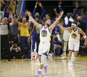  ?? JED JACOBSOHN — THE ASSOCIATED PRESS ?? The Warriors’ Stephen Curry celebrates after guard Klay Thompson made a 3-point shot during Game 5 of the NBA Finals June 13.