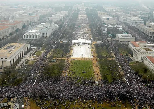  ?? PHOTO: REUTERS ?? Demonstrat­ors take part in the Women’s March to protest Donald Trump’s inaugurati­on as the 45th president of the United States near the US Capitol in Washington.