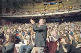  ?? Gina Ferazzi Los Angeles Times ?? THE CROWD cheers Brian Wilson and band after Friday’s show at the Pantages.