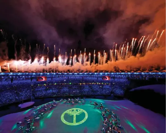  ?? FABRIZIO BENSCH/REUTERS ?? The opening ceremony starts with a pyrotechni­c flourish Friday night at the main Olympic stadium in Rio de Janeiro, host of the first Games to be held in South America.