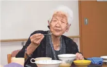  ?? THE ASAHI SHIMBUN VIA GETTY IMAGES ?? Kane Tanaka, shown at lunch in 2018 in Fukuoka, Japan, died April 19, as the second-oldest person ever, according to Guinness World Records.