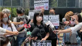  ??  ?? Supporters of Wong demonstrat­ed outside the court with banners saying the the vigil was 'no crime'