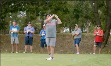  ??  ?? Mark Chappell hits a booming drive on the 2nd hole, Par 4, 6th hole.