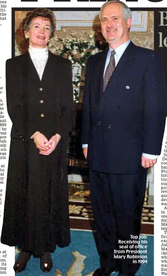  ?? ?? Top job: Receiving his seal of office from President Mary Robinson in 1994