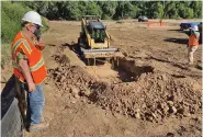  ?? COURTESY BUREAU OF RECLAMATIO­N ?? Albuquerqu­e Area Office archaeolog­ist Larry Moore oversees excavation at San Ildefonso Pueblo as constructi­on begins on the Pojoaque Basin Regional Water System.