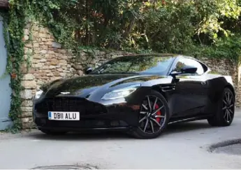  ?? CRAIG COLE/AUTOGUIDE AND ASTON MARTIN ?? Aston Martin’s latest grand tourer, the V8-powered DB11, is an ultraluxur­y coupe.