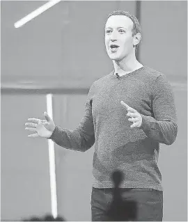  ?? JEFFERSON GRAHAM/USA TODAY ?? Facebook CEO Mark Zuckerberg takes the stage Tuesday at the San Jose McEnery Convention Center.