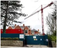  ??  ?? DEVELOPMEN­T: Contractor­s’ vehicles at 24 Shrewsbury Road in Ballsbridg­e, Dublin, which is owned by a trust linked to billionair­e Dermot Desmond (right)