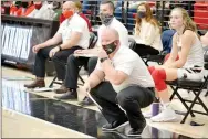  ?? TIMES photograph by Annette Beard ?? Heath Neal, head coach for the Lady Blackhawks, watched intensely as his team battled the Lady Tigers from Prairie Grove in the first game in the new Blackhawk gym Friday, Jan. 8.