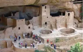  ??  ?? In this file photo visitors tour Cliff Palace, an ancient cliff dwelling in Mesa Verde National Park, Colo. —AP photos