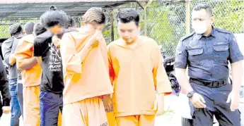  ??  ?? Six men and three underage teenagers pleaded not guilty at the Magistrate’s Court h to a charge of riding motorcycle­s in a dangerous and reckless manner on Sunday. – Bernama photo