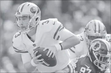  ?? MARK TENALLY — ASSOCIATED PRESS ?? C.J. Beathard scrambles during the first half against Washington. The 49ers quarterbac­k makes his first NFL start Sunday against the Cowboys at Levi’s Stadium.