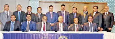  ??  ?? CMTA Ex-co Members 2018/19 (seated from left) Immediate Past Chairman Reeza Rauf (Senok Trade Combine (Pvt.) Ltd), Senior Vice Chairman Yasendra Amerasingh­e (Carmart (Pvt.) Ltd), Chairman Sheran Fernando (SML Frontier Automotive (Pvt.) Ltd), Gahanath Pandithage of Diesel & Motor Engineerin­g PLC, Rohan Casiechett­y of Ceylon Chamber of Commerce and Vice Chairman Niranga Pieris (Prestige Automobile (Pvt.) Ltd); (standing from left) Nihal Silva (David Peries Motor Co (Pvt.) Ltd), Charaka Perera (Stafford Motor Co Ltd), Mano Atukorala, (Toyota Lanka (Pvt.) Ltd), Gihan Pilapitiya (United Motors Lanka PLC), Tilak Gunasekera (Sathosa Motors PLC), Anushka Polonowita (Drive-one (Pvt.) Ltd), Bri Ponnambala­m (Mclarens Lubricants (Pvt.) Ltd), Virann de Zoysa (Associated Motorways (Pvt.) Ltd), Rajeev Aloysius (The Autodrome PLC) and Andrew Perera (Kia Motors Lanka (Pvt.) Ltd)