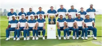  ??  ?? JERSEY CITY: Members of the Internatio­nal Team pose for a photo prior to practice rounds for the Presidents Cup at Liberty National Golf Club yesterday in Jersey City, New Jersey. — AFP