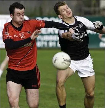  ??  ?? Mark McGoldrick of St Mary’s and Eoin Coleman, Tubbercurr­y contest for the ball. Pics: Tom Callanan.