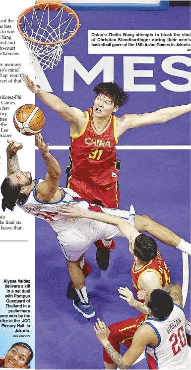 ??  ?? China’s Zhelin Wang attempts to block the shot of Christian Standhardi­nger during their men’s basketball game at the 18th Asian Games in Jakarta. AP