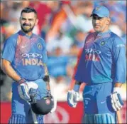  ?? GETTY IMAGES ?? Virat Kohli (left) features in both the ODI and Test teams of the decade while MS Dhoni is part of the former.