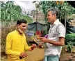  ??  ?? Chandra Kumar on a house-tohouse campaign in a tea estate in his electorate Nivitigala, Ratnapura last week. Courtesy-FB/Chandra Kumar