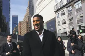  ?? Earl Wilson / New York Times ?? Heavyweigh­t champion Anthony Joshua of Great Britain takes a stroll around New York City, where he will make his American debut June 1.