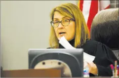  ?? Erik Verduzco ?? Las Vegas Review-journal @Erik_verduzco District Judge Jennifer Togliatti, shown here at a Dec. 5 hearing, sentenced Walter Laak to a minimum of more than 18 years in prison.