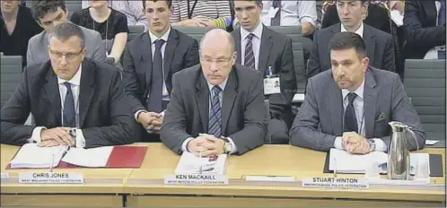  ??  ?? Sergeant Chris Jones, Inspector Ken MacKaill and Detective Sergeant Stuart Hinton before the home affairs select committee