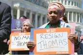  ?? YURI GRIPAS/ABACA PRESS ?? Activists call on Supreme Court Justice Clarence Thomas to resign April 19 in Washington.
