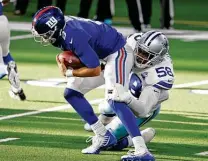  ?? Ron Jenkins / Associated Press ?? Cowboys defensive end Aldon Smith, sacking Giants quarterbac­k Daniel Jones, was first-team All-pro in 2012.