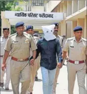  ?? PTI PHOTO ?? The main accused in the Junaid Khan lynching case being produced in Faridabad district court on Sunday.