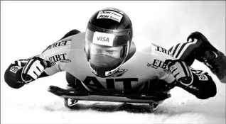  ?? JEFF MCINTOSH/ CP ?? Canada’s Jeff Pain gives a little fist pump after claiming a bronze medal at a World Cup skeleton race in Calgary yesterday. First place in the event went to Switzerlan­d’s Gregor Staehli.