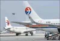  ?? TANG KE / FOR CHINA DAILY ?? China Eastern aircraft on the tarmac at the internatio­nal airport in Yantai, Shandong province.