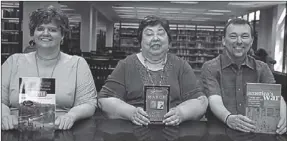  ??  ?? Dalton State’s Roberts Library has 20 sets of books to loan for an upcoming Civil War book discussion series. From left, are Heather Shores of the Bandy Center, library director Lydia Knight and Bandy Center’s Dr. John Fowler.