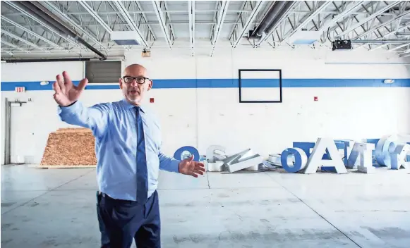  ??  ?? Al Gossett, president of Gossett Motor Cars, leads a tour Tuesday of the future Moore Tech Automotive Technician School at 2785 S. Mendenhall Road. PHOTOS BY YALONDA M. JAMES / THE COMMERCIAL APPEAL