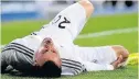  ??  ?? PAIN GAME Jese feels the force of a heavy tackle against Schalke in 2014