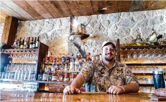  ?? J.C. Reid/Contributo­r ?? Grant Pinkerton of Pinkerton’s Barbecue got his start cooking for friends and family before opening a restaurant. Now he spends time fine-tuning his craft on the competitio­n circuit.