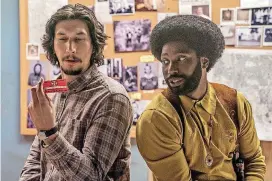  ?? [DAVID LEE/FOCUS FEATURES VIA AP] ?? Adam Driver, left, and John David Washington in a scene from “BlacKkKlan­sman.”