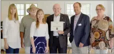  ?? Keith Bryant/The Weekly Vista ?? Bella Vista Arts Council member Demara Titzer (left) stands next to Terry Wilson, while Susan Byrd receives her artist of the month award from Mayor Peter Christie. Dave Barfield and Sara Parnell stand to the side.