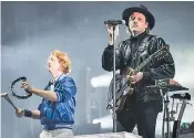  ??  ?? Failing to ignite: Win Butler, right, stalked the stage but rarely interacted with the audience