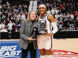  ?? Jessica Hill/Associated Press ?? UConn’s Aaliyah Edwards, right, poses with Big East Conference Commission­er Val Ackerman.