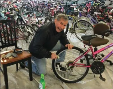  ?? CHARLES PRITCHARD - ONEIDA DAILY DISPATCH ?? Community Bikes Founder and Chair Chuck Fox works on a bike for the upcoming ninth annual Bike Day on Wednesday, May 1, 2019.