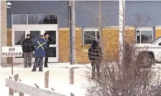  ?? Joshua Mercredi / The Canadian Press via Associated Press ?? La Loche Community School in northern Saskatchew­an was placed on lockdown as authoritie­s continued their investigat­ion into a shooting there. The gunman was arrested outside the school.