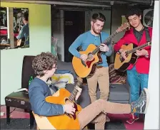  ?? SUBMITTED ?? During the 2018 New London Talent Show, from left, Braiden Sunshine, Andrew Little and Joseph Salcedo strum in the Garde’s Green Room.