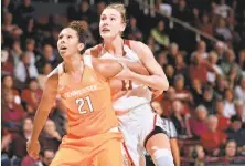  ?? John Todd / ISIPhotos ?? Tennessee center Mercedes Russell, who had 11 points and 10 rebounds, boxes out Stanford forward Alana Smith. The Lady Vols won at Maples Pavilion for the first time since 2005.