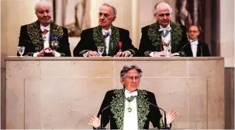  ??  ?? This file photo taken on March 28, 2012 shows French-Polish filmmaker Roman Polanski (front center) delivering a speech during a meeting at the Academie des Beaux-Arts (French Academy of Fine Arts), part of the Institut de France, on March 28, 2012 in Paris. — AFP