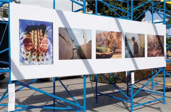  ?? ?? (Clockwise from top) Images from ‘Our Time, Our Dreams’ displayed on scaffoldin­g; ‘Insight’ by Bruno Boudjalal; ‘All or Nothing’ by Safouane Ben Slama; a tribute to Sophia Baraket; Amira Lamti’s ‘Exposition.’