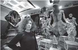  ?? AP Photo/Manuel Balce Ceneta ?? ■ Cuban designer Celia Ledón poses with her fashion creation Tuesday at the Kennedy Center in Washington.