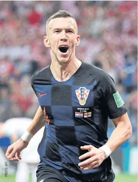  ??  ?? Croatia forward Ivan Perisic celebrates after scoring against England.