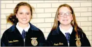  ??  ?? Corrine Burrus, left, and Jordan Horn participat­ed in the FFA Creed competitio­n at an open meet at the University of Arkansas recently. To compete, they are required to memorize the Creed word for word and then answer questions about it by three judges.